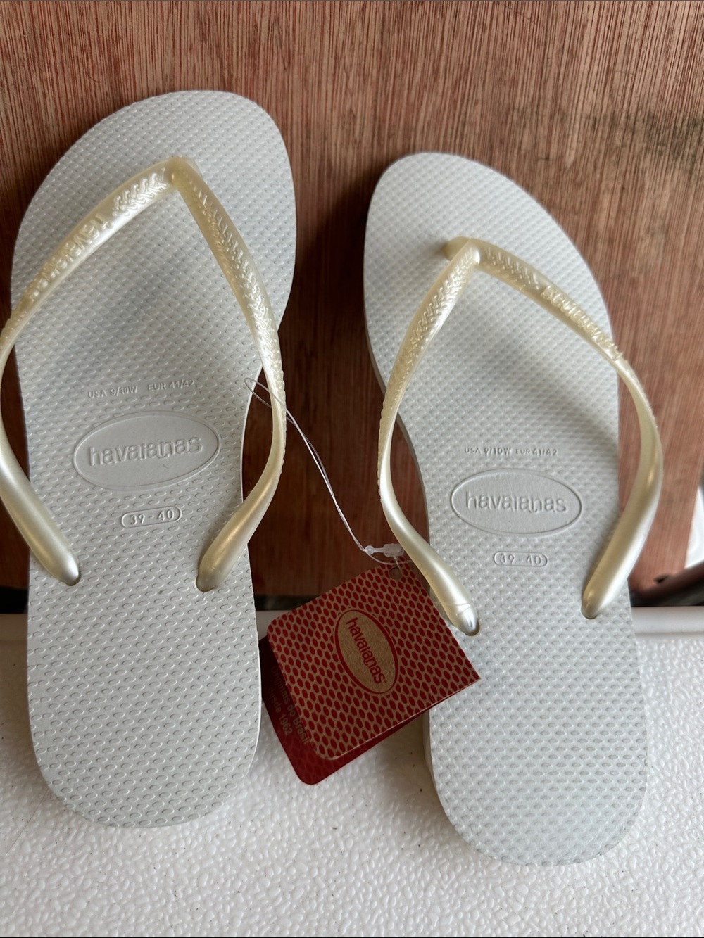 Havaianas Women's Slim Flip Sandals in White with Gold Straps